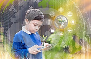 School kid using tablet research on internet about world population, Ecology and Environmental,Boy doing online learning,Geography