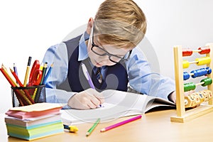 School Kid Writing, Student Child Learn in Classroom, Young Boy in