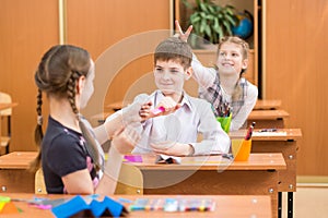 School kids at lesson in classroom photo