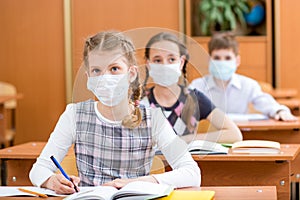 School kids with protection mask against flu virus