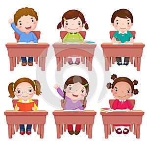 School kids sitting on table photo