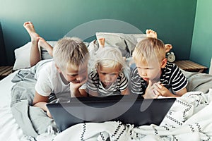 School kids is studying online photo