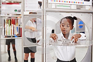 School kids taking part in science tests at a science centre