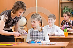 School kids work at lesson