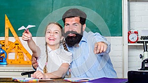 School learners leisure. Creating a community of learners. Teacher and schoolgirl. Man bearded pedagogue and pupil