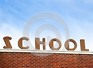 School Letters on Brick Building