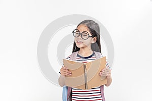 School little girl wearing a glasses carry a bag with backpack hold a books isolated on white background