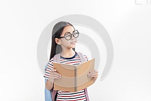 School little girl wearing a glasses carry a bag with backpack hold a books isolated on white background