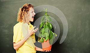 School nature study. teacher woman in glasses at biology lesson. shouting student girl with plant at blackboard. tree of