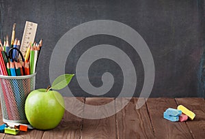 School and office supplies on classroom table