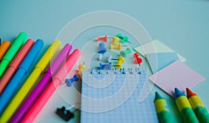 School office supplies on a desk with copy space. Back to school concept.