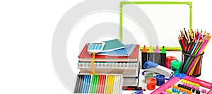 School and office supplies isolated on a white background. Free space for text. Wide photo