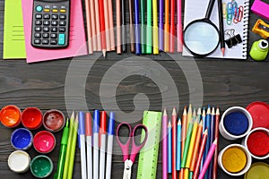 School and office supplies. school background. colored pencils, pen, pains, paper for school and student education