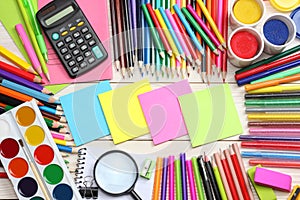 School and office supplies. school background. colored pencils, pen, pains, paper for school and student education