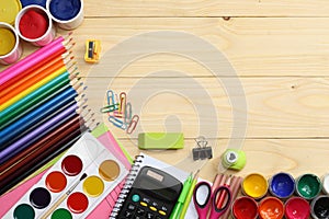 School and office supplies. school background. colored pencils, pen, pains, paper for school and student education