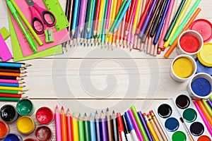 School and office supplies. school background. colored pencils, pen, pains, paper for school and student education