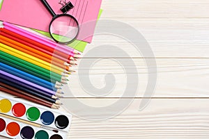 School and office supplies. school background. colored pencils, pen, pains, paper for school and student education