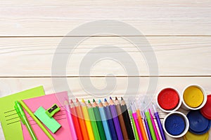 School and office supplies. school background. colored pencils, pen, pains, paper for school and student education