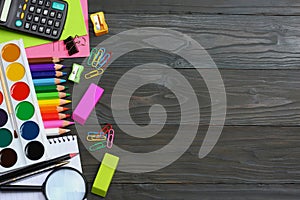 School and office supplies. school background. colored pencils, pen, pains, paper for school and student education
