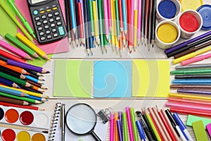 School and office supplies. school background. colored pencils, pen, pains, paper for school and student education