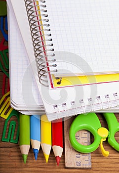 School or office tools on wooden board