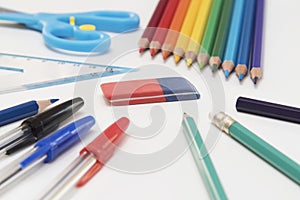 School and Office Utensils on a White Surface