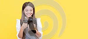 school of photography. hobby or future career. photographer beginner. Child photographer with camera, horizontal poster