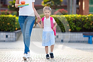 School pick up. Mother and kids after school