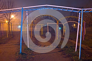 School playground on a foggy night in city centre Poltava, Ukraine