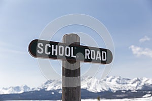 School Road Sign in Mountain Town