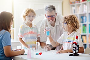 School science class. Students at chemistry lesson