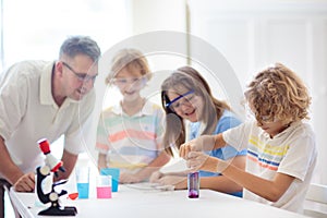 School science class. Students at chemistry lesson