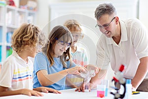 School science class. Students at chemistry lesson