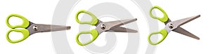School scissors closed open and wide open, green handle isolated on white. Kids safe tool