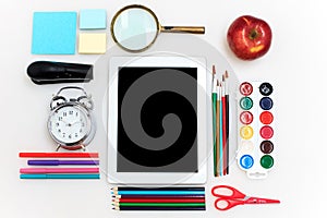 School set with notebooks, pencils, brush, scissors and apple on white background