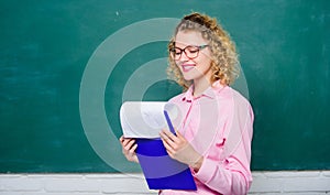 School staff. Smart woman hold tablet documents. Read impressing resume. School principal hiring workers. School teacher