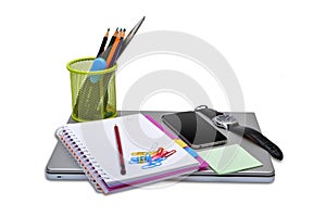School Stationery Items with smartphone and laptop