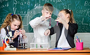 School stuff. biology experiments with microscope. Chemistry science. Little girls and boy in lab. Little kids earning