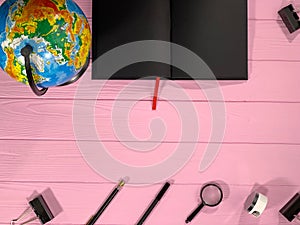 School subjects on a pink background, globe.