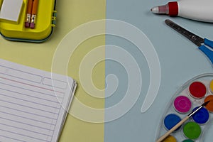 School supplies on 2 color flatlay background