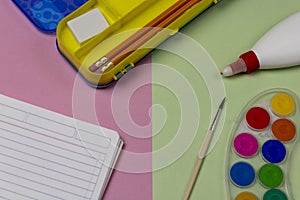 School supplies on 2 color flatlay background