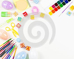 School supplies, child creativity concept flat lay. Various artistic tools for children on white desktop. Copy space