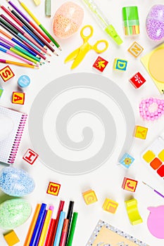 School supplies, child creativity concept flat lay. Various artistic tools for children on white desktop. Copy space