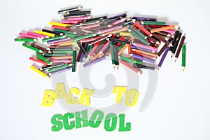 Back to school ,School supplies colored pencils in Fall scattered, isolated