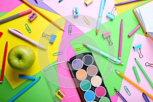 School supplies on colorful background