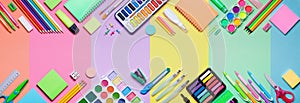 School Supplies With Colorful Paper Background