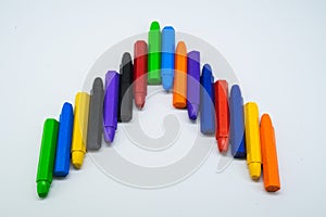 School supplies, colourful crayons stationery on white background