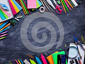 School Supplies In Frame On Blackboard