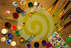 School supplies on a green background, background with colorful pencils and pens, back to school concept, abstract colorful backgr