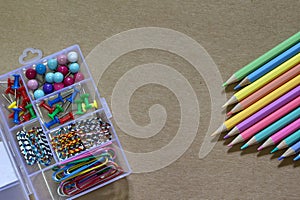 The School supplies on paper brown background ready for your design